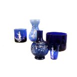 A 19th century Bristol Blue glass cylindrical bowl, together with four pieces of Mary Gregory