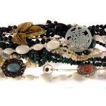 An assortment of costume jewellery, to include malachite necklaces, an open faced fob watch,