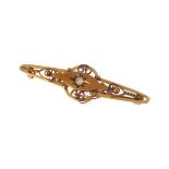 A Victorian 15ct gold bar brooch, with shaped mount, centred with an old cut stone, approx 3g