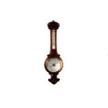 A carved oak wall barometer, having swag and floral design to the body