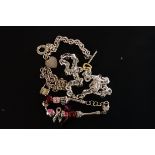 A selection of modern silver jewellery, including bracelets, a heart link necklace, a bead bracelet,