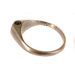 A rare vintage risqué Stanhope signet ring, the plated metal ring with plain tablet concealing a