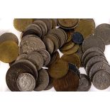 A collection of various coinage, including florins, shilling, copper pennies, half pennies and