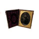 A 19th Century daguerrotype gilt metal framed vintage photograph, in case with floral and swag