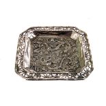 A small Chinese silver pin dish, having dragon amongst rose decoration to base and pierced floral