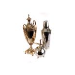 A selection of silver plated items, to include an egg waiter, a cocktail shaker, a cruet set, a