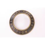 A Garrett Traction Engine Brass Smokebox ring: The “Garrett” Traction’ around the circle in cast