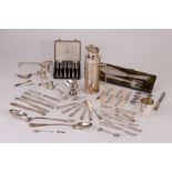 A collection of silver and silver plated items, including a cased set of silver cake forks, a