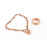 A 9ct gold ring together with a 9ct gold heart padlock bracelet 20g