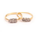 Two diamond three stone rings, both with platinum illusion set brilliant cuts on 18ct gold bands (2)