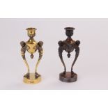 A pair of late Victorian neoclassical silver gilt candlesticks, each modelled as a vase supported by