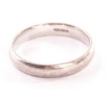 An 18ct gold lady’s wedding band, the plain band hallmarked to inner, approx 2.5g, size J