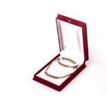 A modern Turkish 14ct gold and gem set necklace and bracelet set, both with white and yellow gold