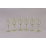 A set of six James Powell & Sons (Whitefriars) green radon wine glasses, of the late 19th century