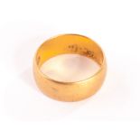 A 22ct gold wedding band, approx 8.7g