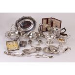 A collection of silver plated items, including a Sheffield plate candle snuff tray and small tray, a