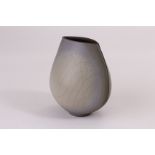 A David White (1934-2011), flattened obovoid vase finished in a matt pastel crackle glaze, marked to