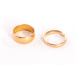 Two 22ct gold wedding bands, both plain and hallmarked, approx 11.7g (2)