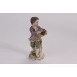 A late nineteenth, or early twentieth century Meissen figure group, modelled as a young man
