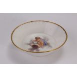 An eighteenth century Sevres saucer decorated with a hand painted cherub and globe scene to a