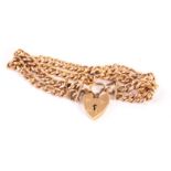 A mid-20th century 9ct twin chain bracelet, with heart clasp, by J.W. & S. 20g