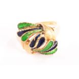 An 18ct gold and enemalled dress ring, the retro style large tablet with champleve green and blue