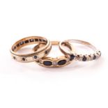 Three gold and gem set rings, one white 18ct gold seven stone with sapphires and diamonds, one