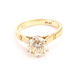 An impressive diamond solitaire engagement ring, the good quality fancy coloured brilliant cut of