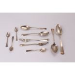 A group of antique continental silver and white metal spoons and forks, including a spoon and fork
