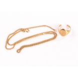 An 18ct gold signet ring, and 18ct gold curb chain necklace 18g The signet ring has been cut