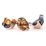 A Royal Crown Derby Blue Jay paperweight, together with a Mandarin Duck and an Owl (3)