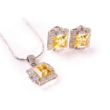 A pretty 18ct gold and citrine pendant and earring suite of jewellery, the pendant with large square