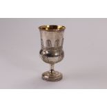 A George III silver chalice by Robert & Samuel Hennell, the thistle shaped vessel with raised leaf