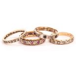 Four gold and gem set eternity rings, including two full eternity bands, and two half hoop rings (4)