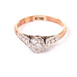 A vintage diamond solitaire engagement ring, the transitional brilliant cut in platinum claws and