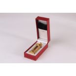 A Parfums Cartier perfume atomiser, in original red Moroccan case and complete with velvet pouch