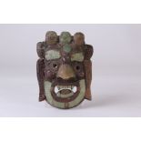 A Balinese Barong style mask, in copper and white metal finish 20.5cm H