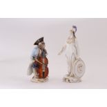 A Meissen porcelain figure, modelled as a monkey in Regency attire playing the chello, restored to