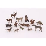 A collection of 19th century Viennese cold painted bronze animal groups, modelled as Peter Rabbit, a