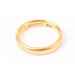 A 22ct gold wedding band, the plain ring hallmarked to inner