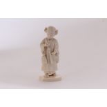 A late Meiji period Tokyo school carved ivory figure of a young girl, the pretty girl carrying a