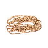 A vintage 9ct gold muff chain, opera length oval link chain with watch style clasp marked 9ct,