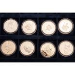 A collection of thirty two silver proof coins, relating to the Queen Mother and The Lady of the