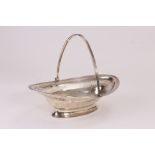 A George III silver bread basket by Henry Chawner, the oval footed dish with pierced sides and