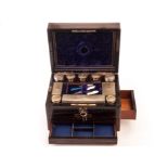 A Victorian Macassar ebony lady’s fitted travel case, complete with silver plated necessaires de