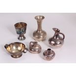 A collection of six continental silver and white metal items, including three stylish small vases, a