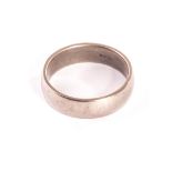 A modern palladium gentleman’s wedding band, the plain band marked 500 to inner, approx 7.4g