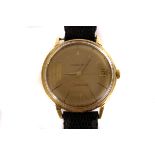 A 14ct gold Eterna-matic gents wrist watch, having baton numerals and date window, on black