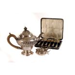 A Victorian silver bachelor's tea pot, marked Sheffield 1898, together with a Birmingham marked