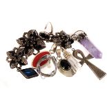 A suite of silver and black enamel Art Deco period jewellery, comprising a ring, earrings and
